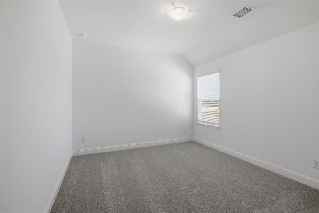 2911 Hanscom Street Forney, TX 75126 - Photo 10 of 40 Room featuring neutral wall finishes and grey carpeting