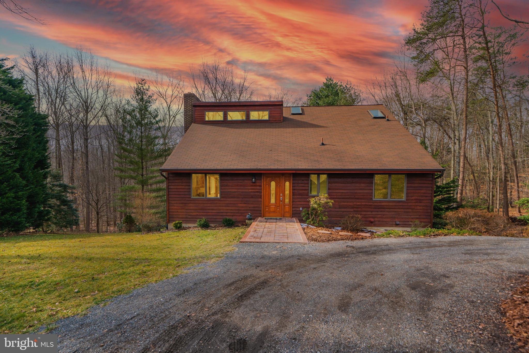 6251 Stephen Reid Road Huntingtown, MD 20639 - Photo 1 of 46 a view of a house with a yard