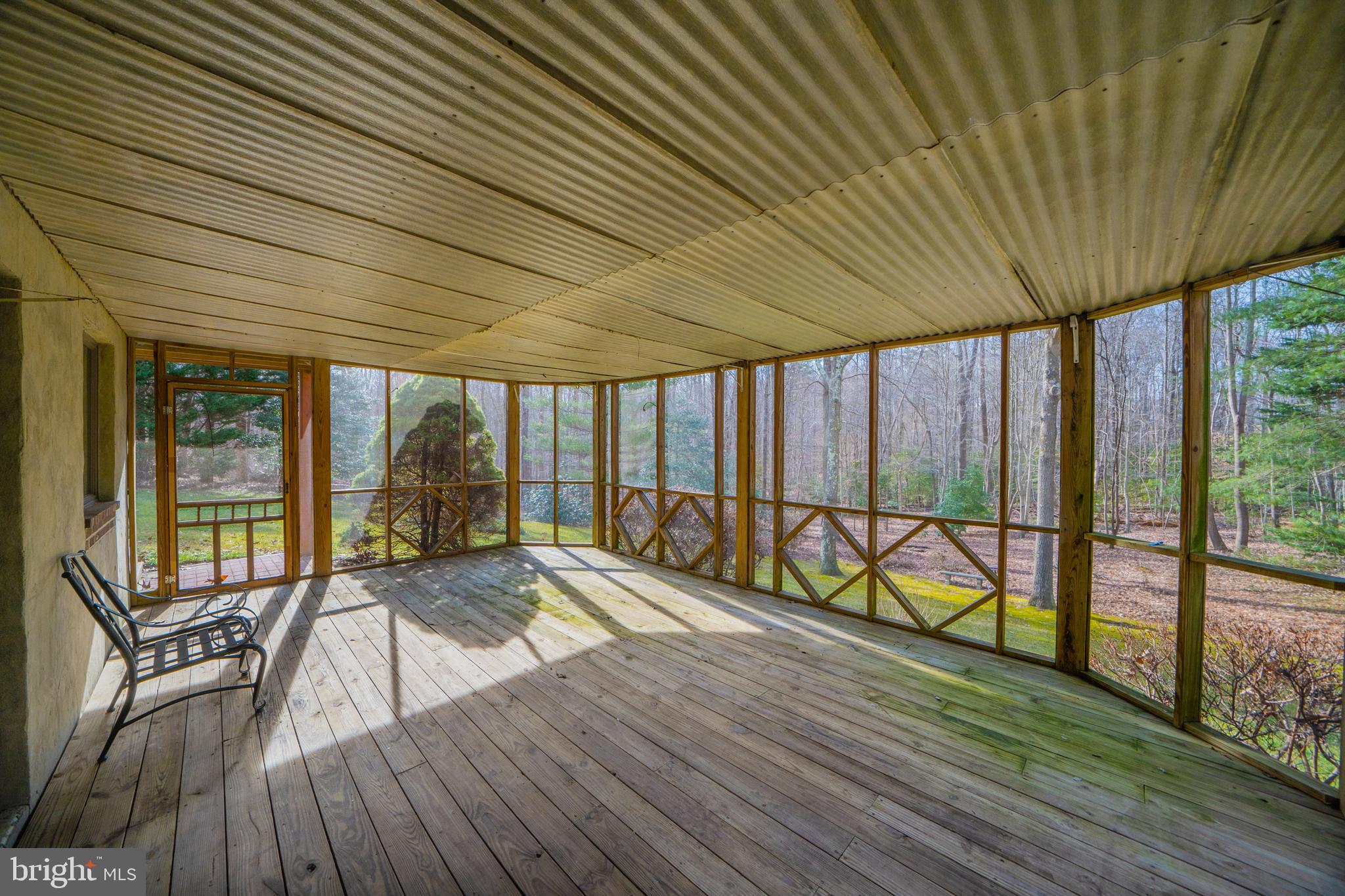 6251 Stephen Reid Road Huntingtown, MD 20639 - Photo 11 of 46 a view of a patio with wooden floor