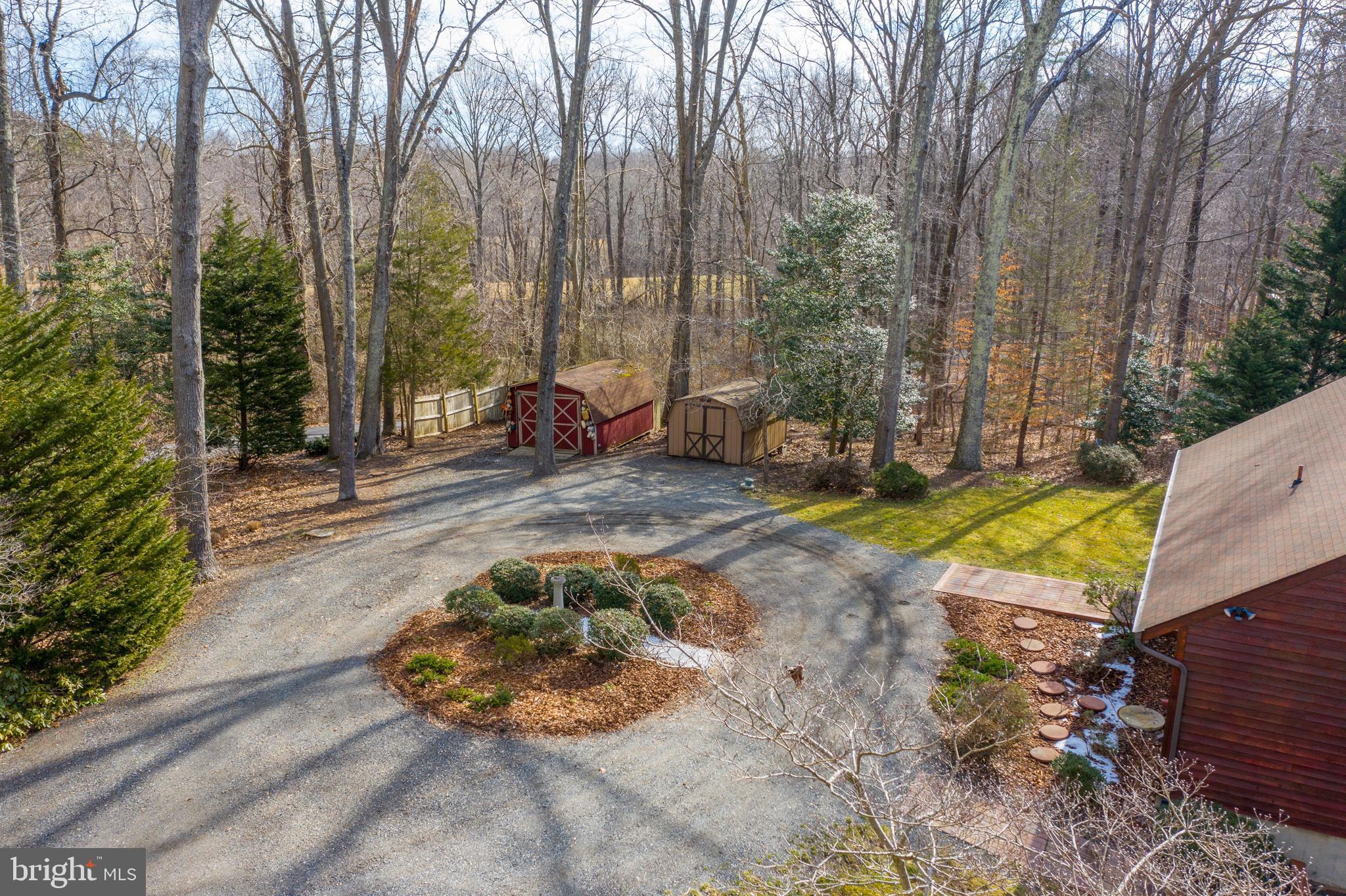6251 Stephen Reid Road Huntingtown, MD 20639 - Photo 36 of 46 a view of a backyard with swimming pool