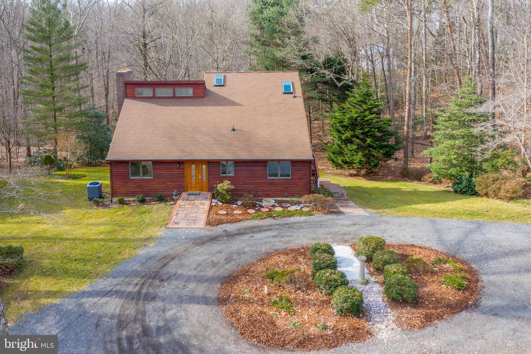 6251 Stephen Reid Road Huntingtown, MD 20639 - Photo 37 of 46 a view of a house with a yard