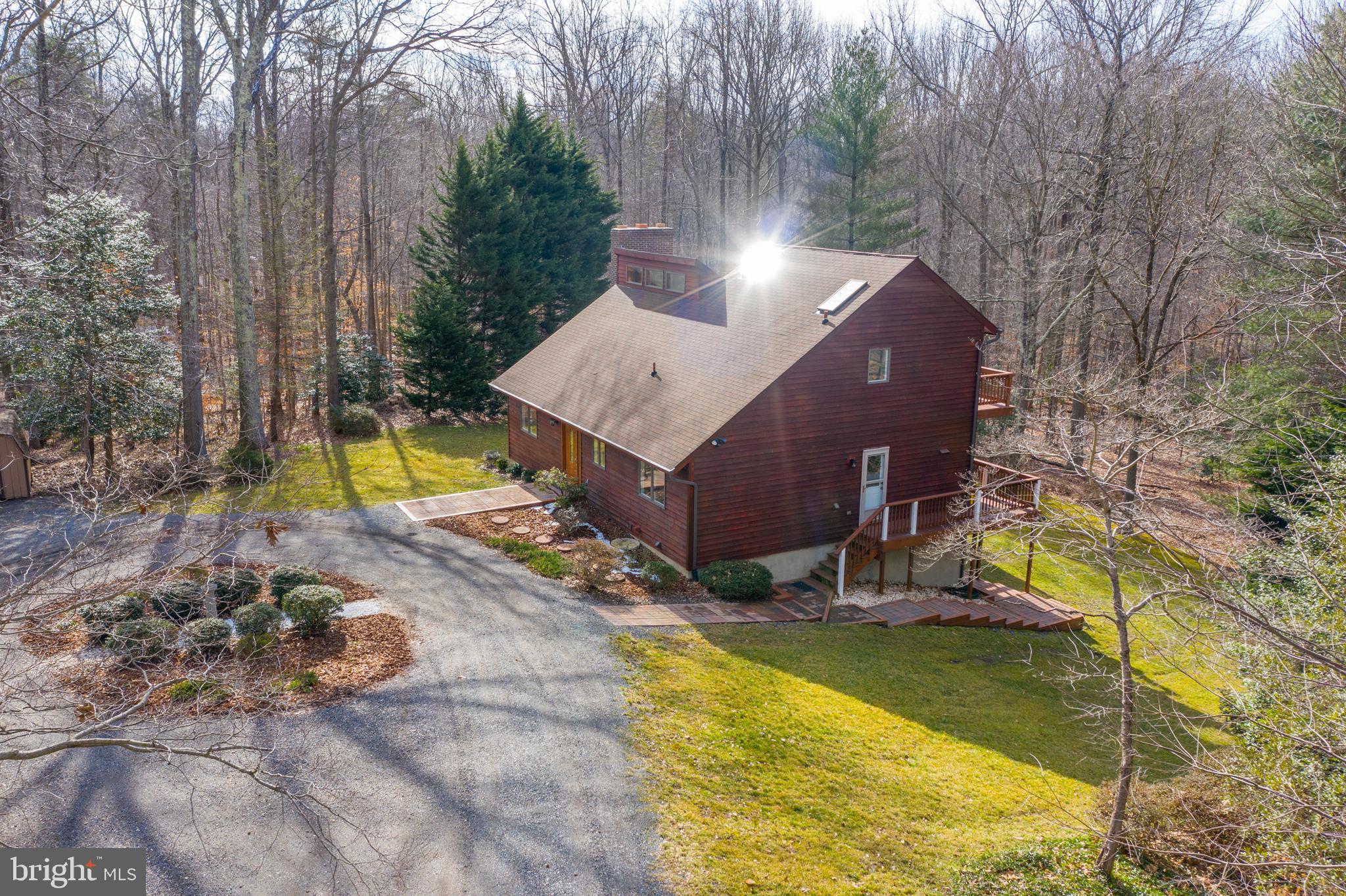 6251 Stephen Reid Road Huntingtown, MD 20639 - Photo 6 of 46 a view of a backyard with swimming pool
