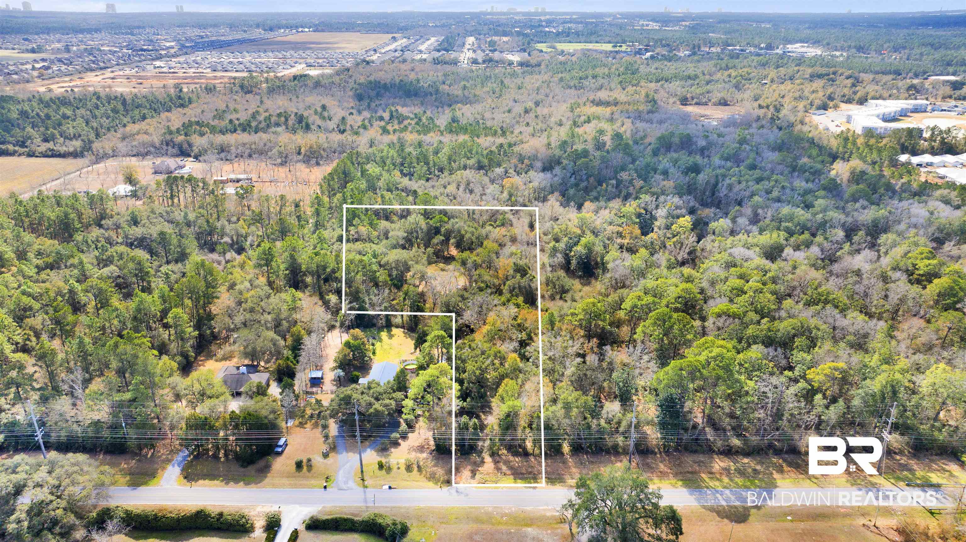 20568 Keller Road Foley, AL 36535 - Photo 1 of 13 View of property location featuring property parcel outlined and a forest