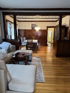 123 St Andrew Road, Unit 2 Boston, MA 02128 - Photo 3 of 8 a living room with furniture and a fireplace