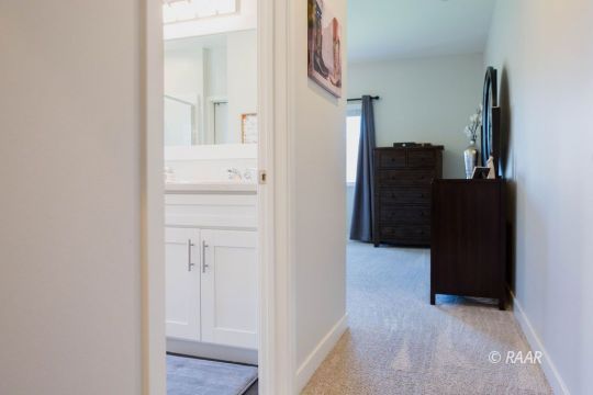 419 Abigail Street Ridgecrest, CA 93555 - Photo 19 of 34 a view of a bedroom with closet and mirror