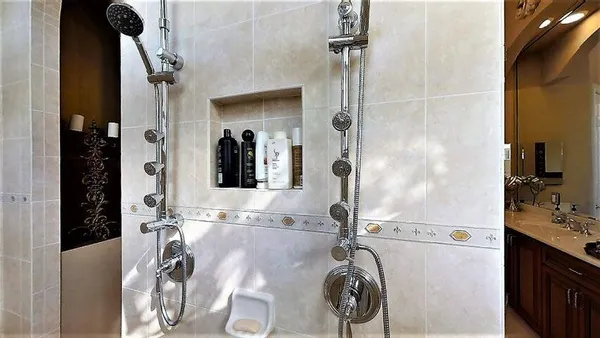 a bathroom with a tub and shower curtain