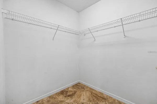 a view of a room with racks on the wall