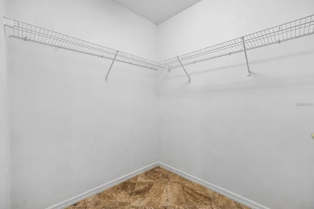 a view of a room with racks on the wall