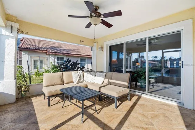a outdoor space with patio the couches and a dining table with garden view