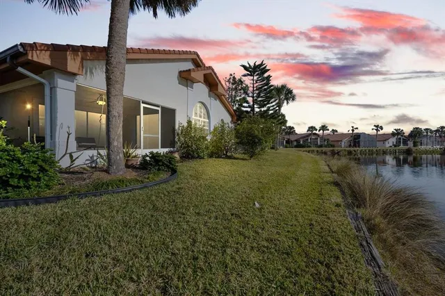 a view of a house with a yard