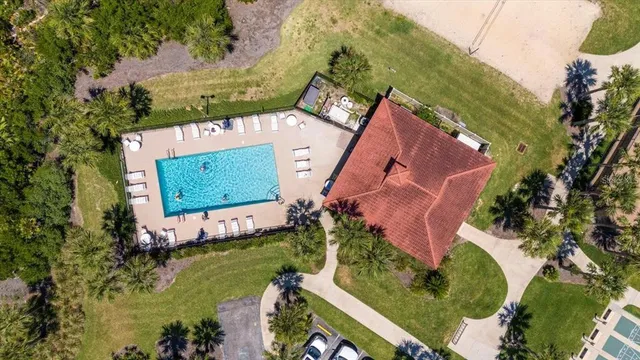 an aerial view of a house with a garden