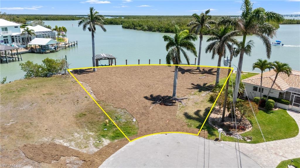 159 Tahiti Street Naples, FL 34113 - Photo 3 of 15 Bird's eye view with a water view