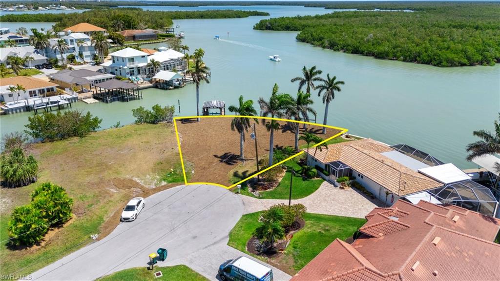 159 Tahiti Street Naples, FL 34113 - Photo 5 of 15 Birds eye view of property with a water view and a residential view