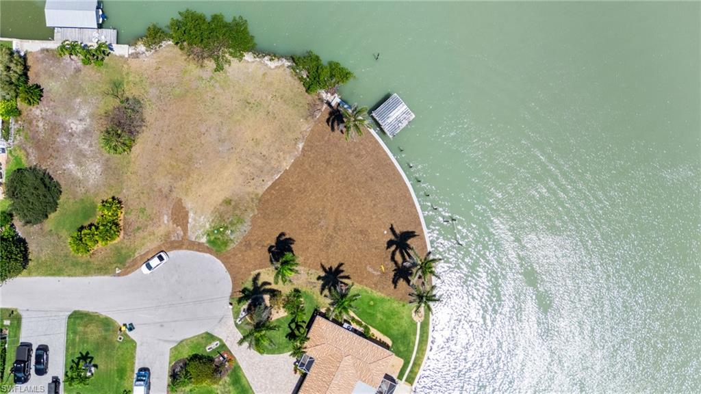 159 Tahiti Street Naples, FL 34113 - Photo 9 of 15 Drone / aerial view with a water view