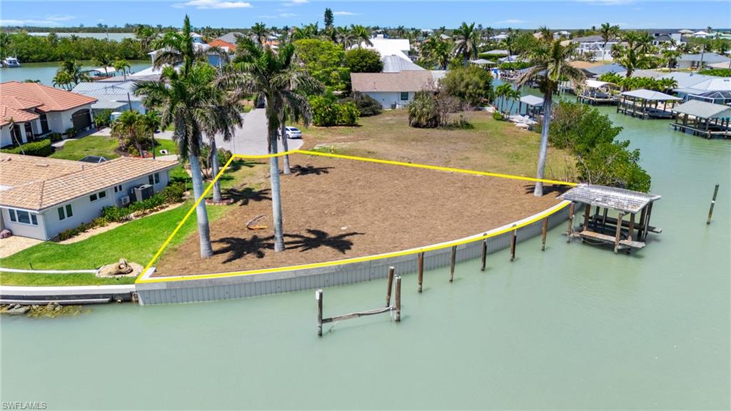 159 Tahiti Street Naples, FL 34113 - Photo 10 of 15 Birds eye view of property with a water view and a residential view