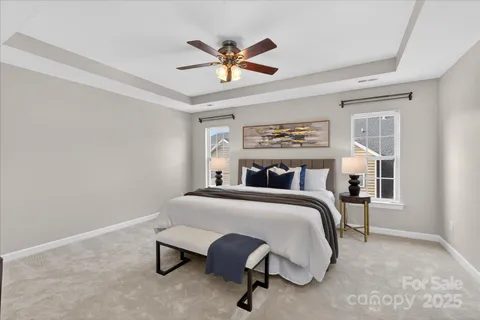 a bed room with a bed and window