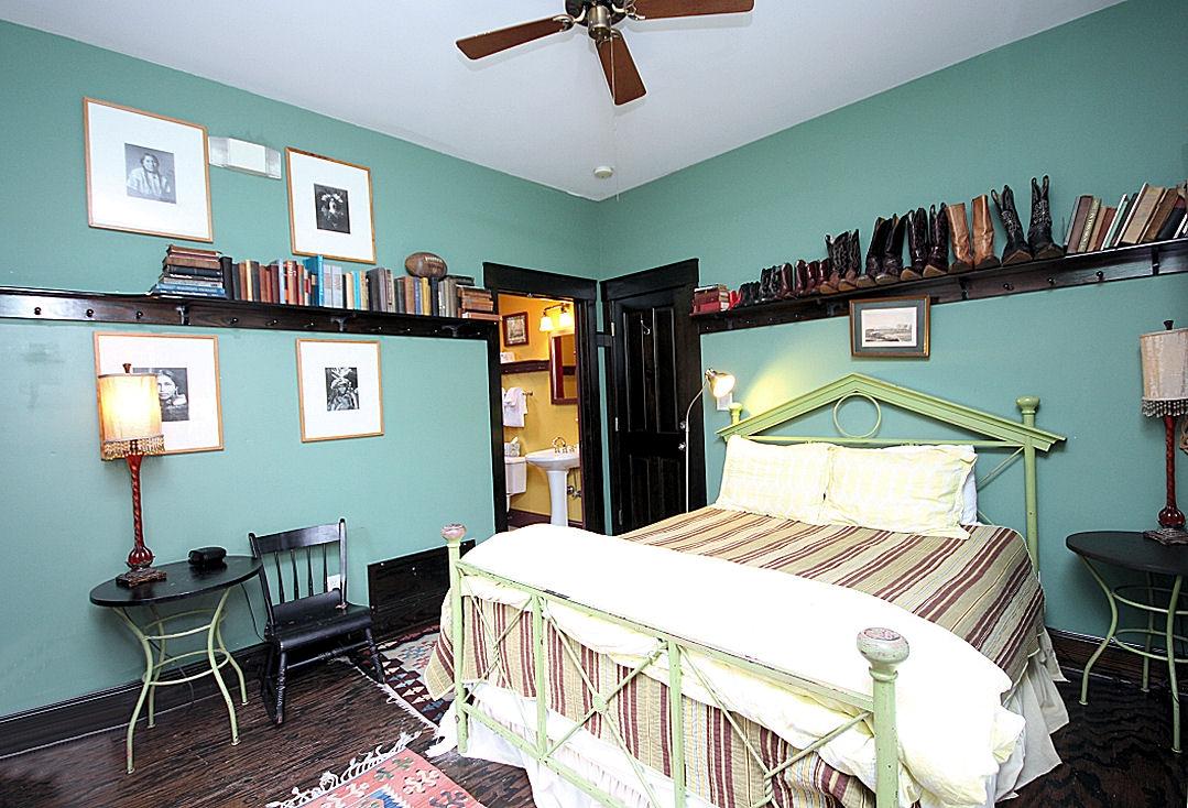 147 Grayton Street Santa Rosa Beach, FL 32459 - Photo 24 of 52 a bedroom with a bed and a chandelier