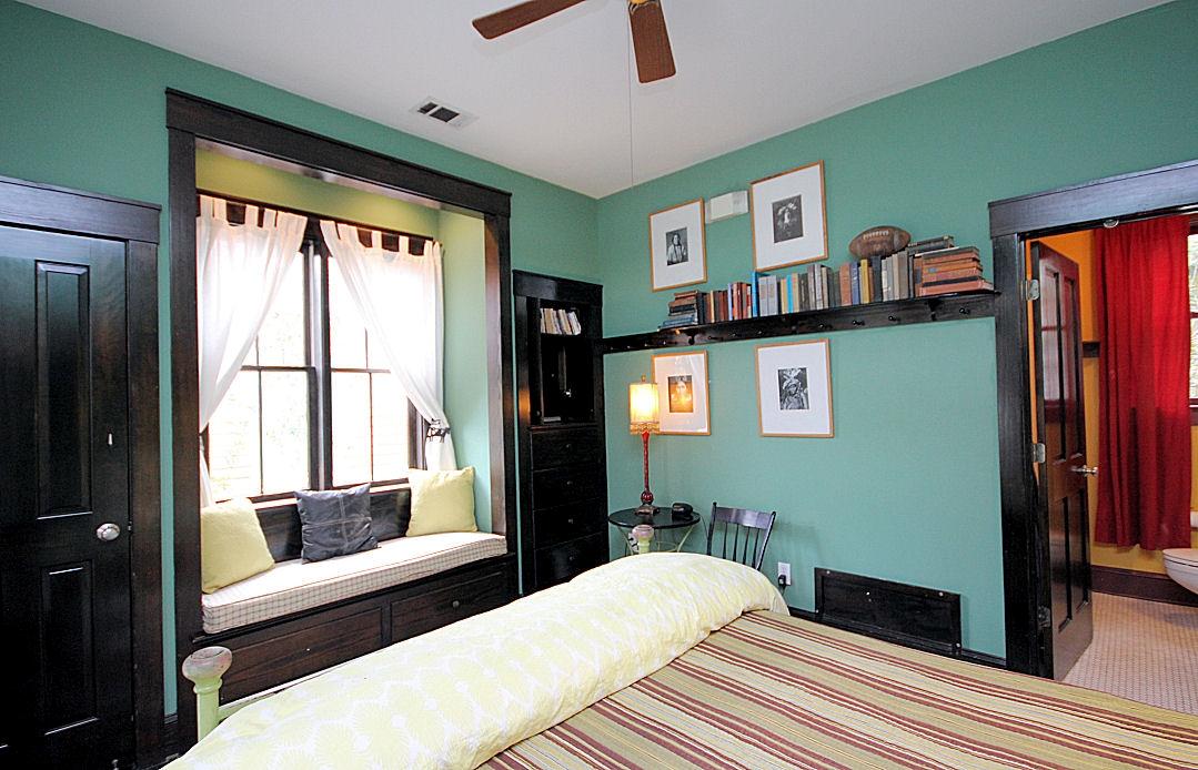 147 Grayton Street Santa Rosa Beach, FL 32459 - Photo 25 of 52 a bedroom with a bed and glass windows