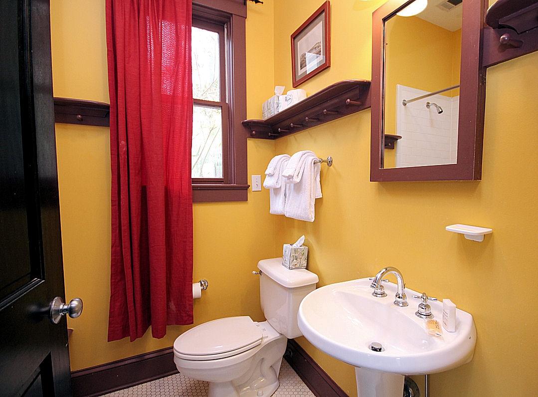 147 Grayton Street Santa Rosa Beach, FL 32459 - Photo 27 of 52 a bathroom with a toilet sink and mirror