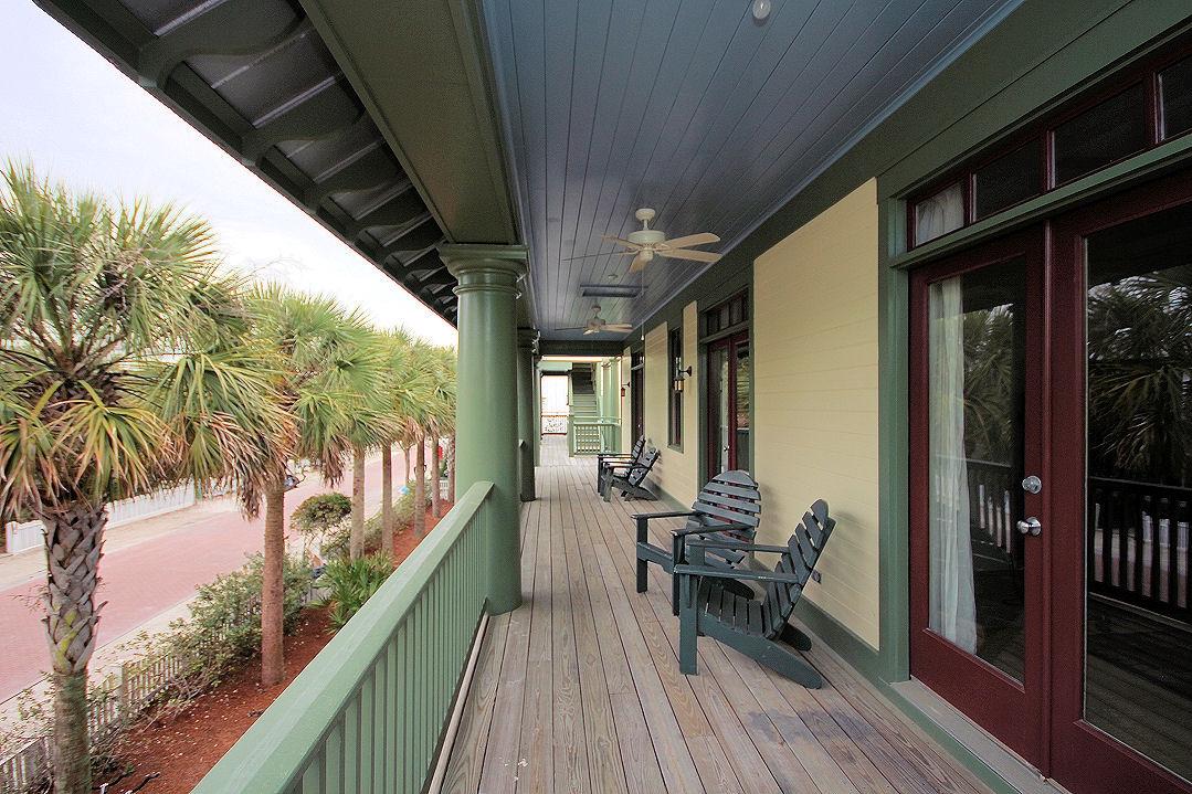 147 Grayton Street Santa Rosa Beach, FL 32459 - Photo 3 of 52 a view of balcony with chairs and wooden fence