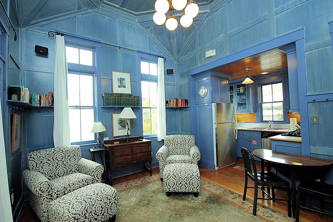 147 Grayton Street Santa Rosa Beach, FL 32459 - Photo 31 of 52 a living room with furniture and a chandelier