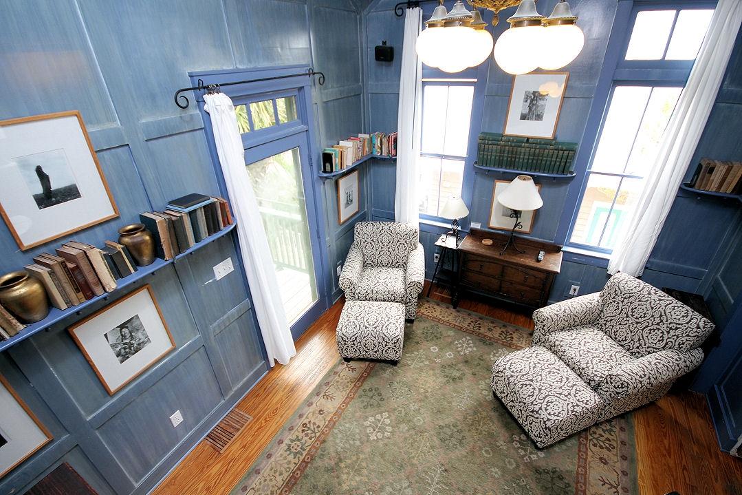 147 Grayton Street Santa Rosa Beach, FL 32459 - Photo 32 of 52 a living room with furniture and a fireplace