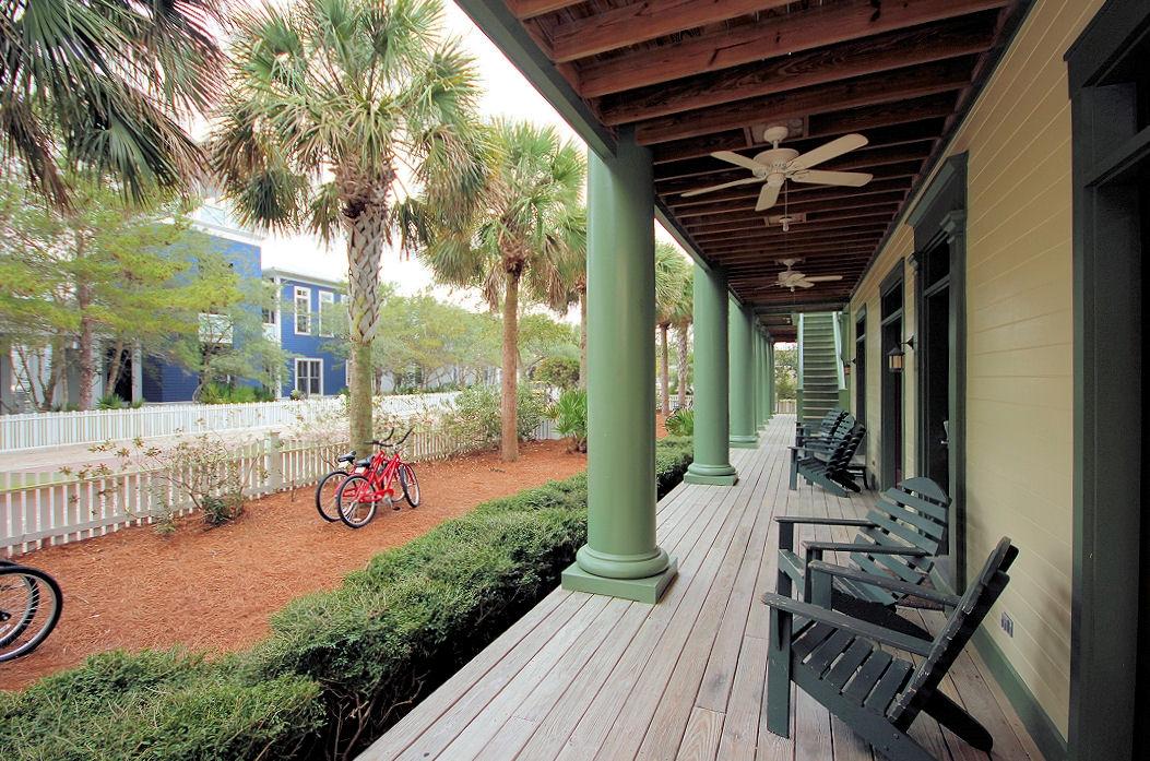147 Grayton Street Santa Rosa Beach, FL 32459 - Photo 4 of 52 a view of a patio with table and chairs and potted plants