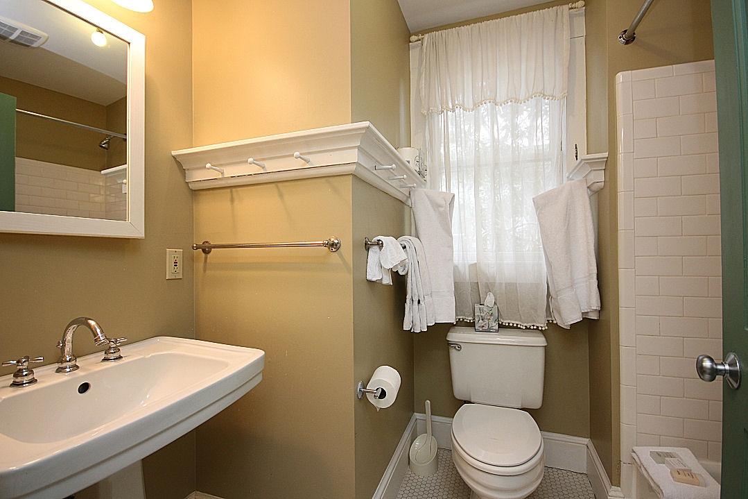 147 Grayton Street Santa Rosa Beach, FL 32459 - Photo 46 of 52 a bathroom with a toilet a sink and shower