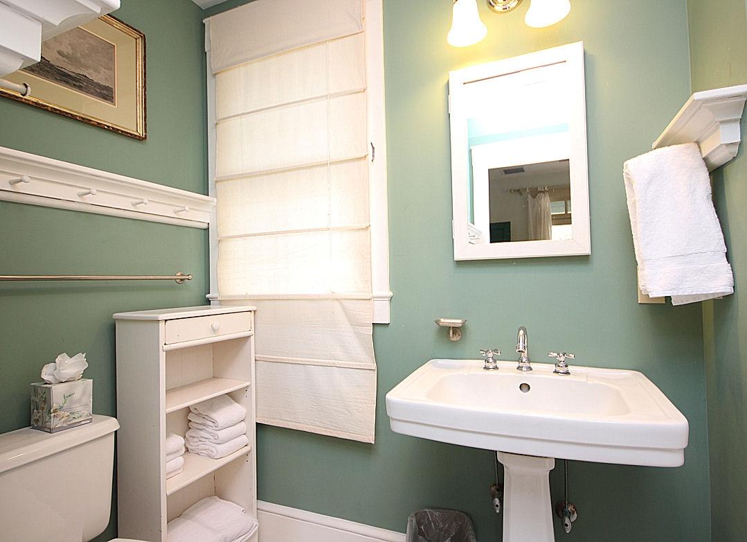 147 Grayton Street Santa Rosa Beach, FL 32459 - Photo 48 of 52 a white sink sitting under a bathroom mirror
