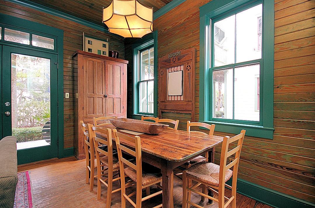 147 Grayton Street Santa Rosa Beach, FL 32459 - Photo 9 of 52 a view of a dinning table and chairs in patio of the house