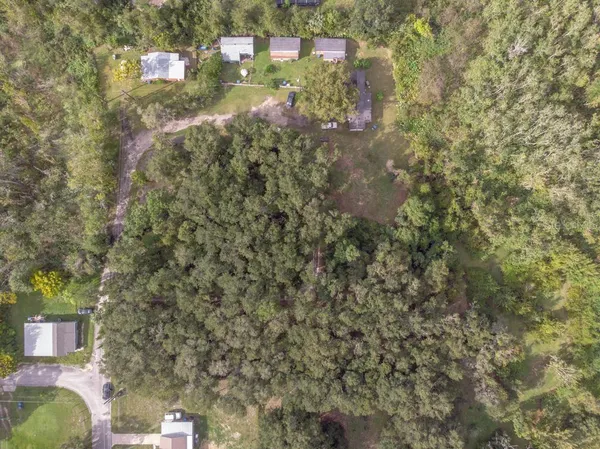 an aerial view of residential building and lake view