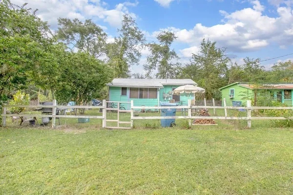a view of house with outdoor space
