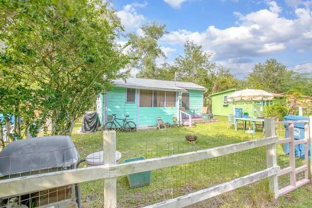 a view of balcony with small garden