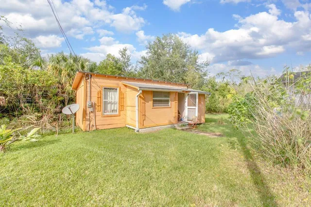 a view of outdoor space and yard