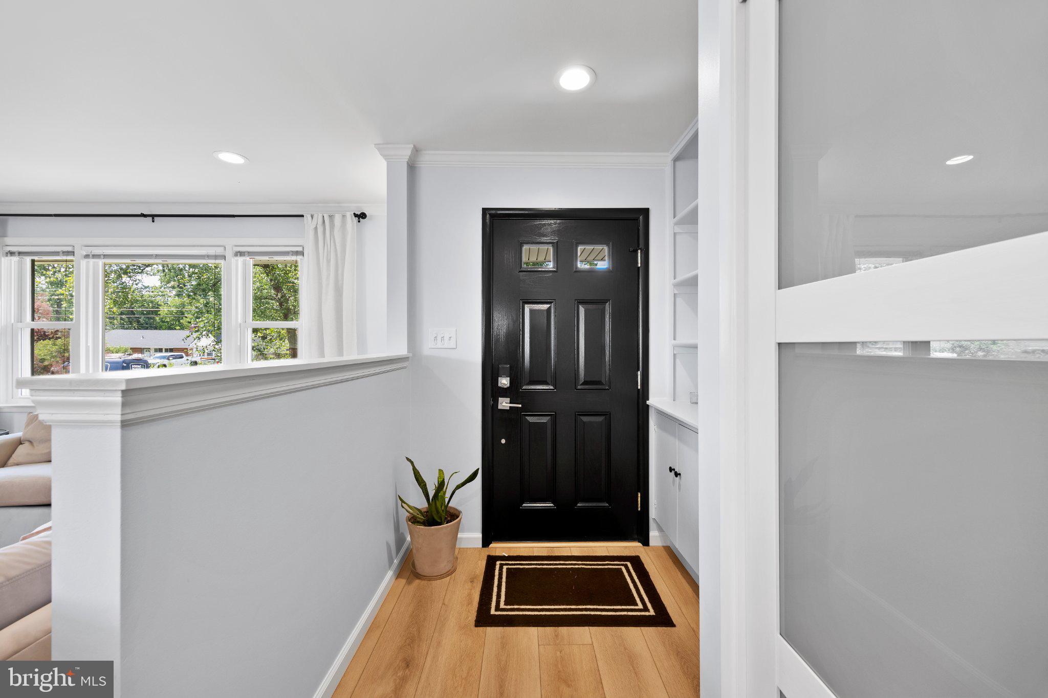 6705 New Hope Drive Springfield, VA 22151 - Photo 6 of 67 Inviting entryway with modern charm.