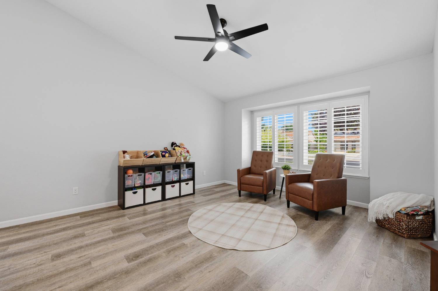5013 Charter Road Rocklin, CA 95765 - Photo 5 of 35 a bedroom with furniture and a window