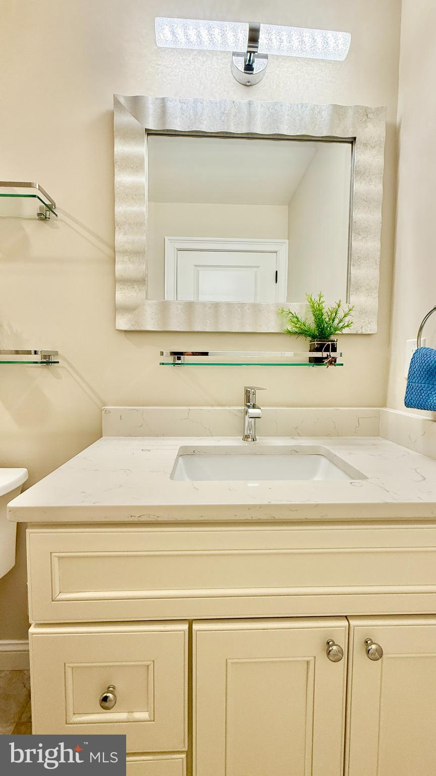 1 Markham Road, Unit 2E Princeton, NJ 08540 - Photo 25 of 30 a bathroom with a sink and a mirror