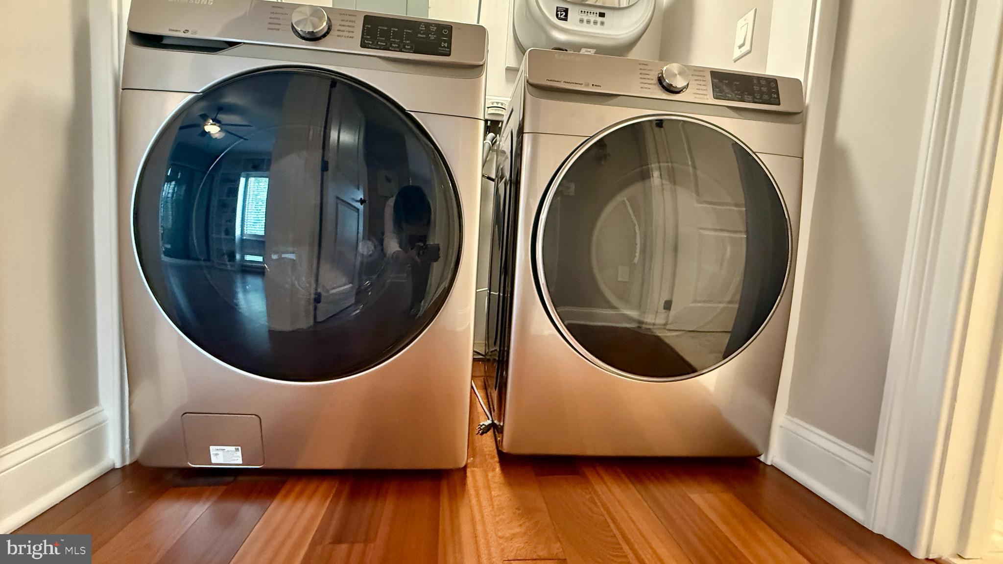 1 Markham Road, Unit 2E Princeton, NJ 08540 - Photo 27 of 30 a view of a hallway with washer and dryer