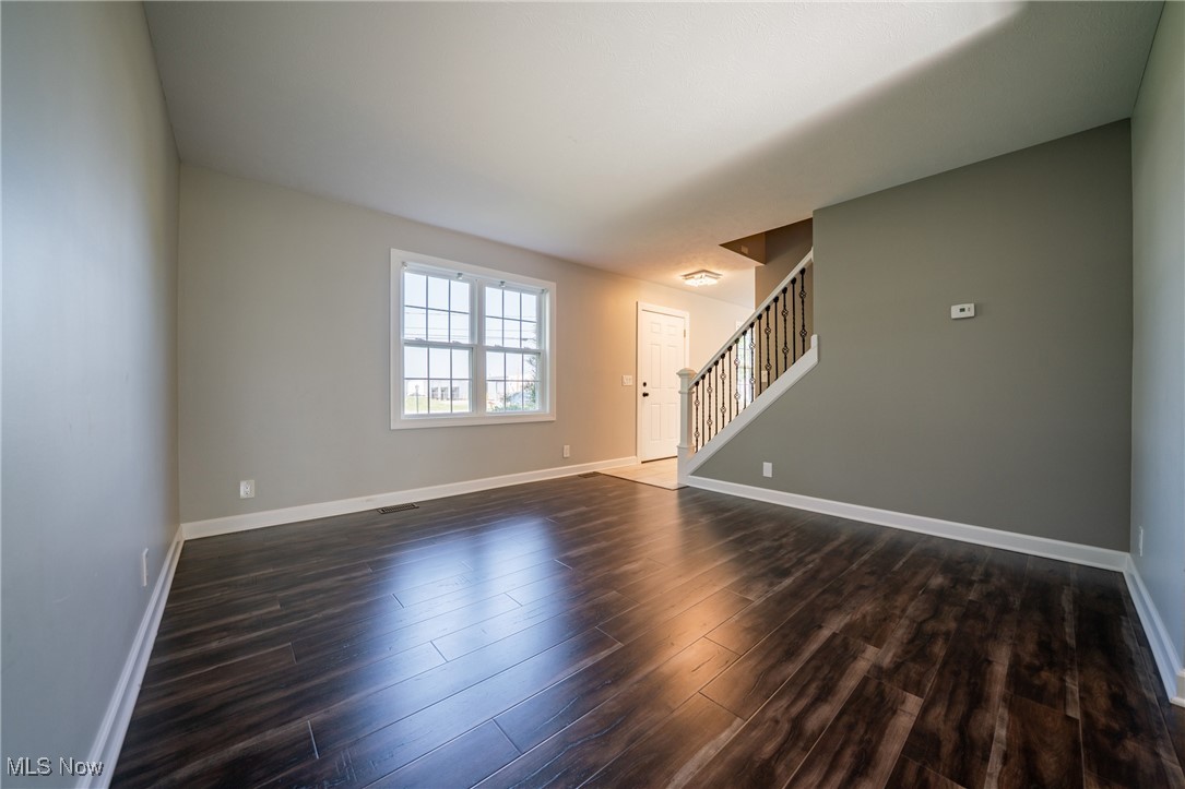 8875 North Marks Road Strongsville, OH 44149 - Photo 19 of 40 Living room With wrought iron bannister spindles