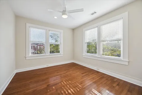 a bathroom with a sink toilet a mirror and shower