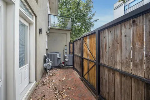 a view of a house with a tree