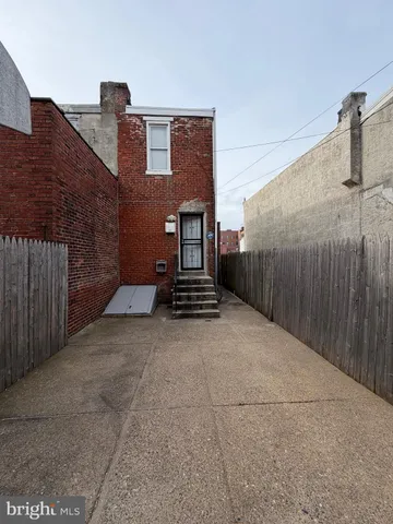 a view of a building and a street
