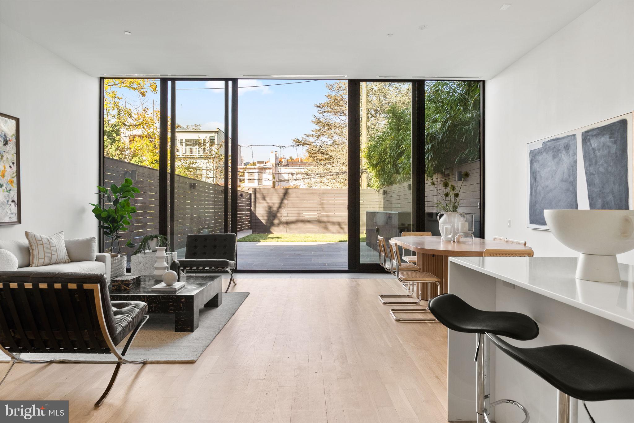 3623 R Street Northwest Washington, DC 20007 - Photo 12 of 87 a living room with furniture and a large window