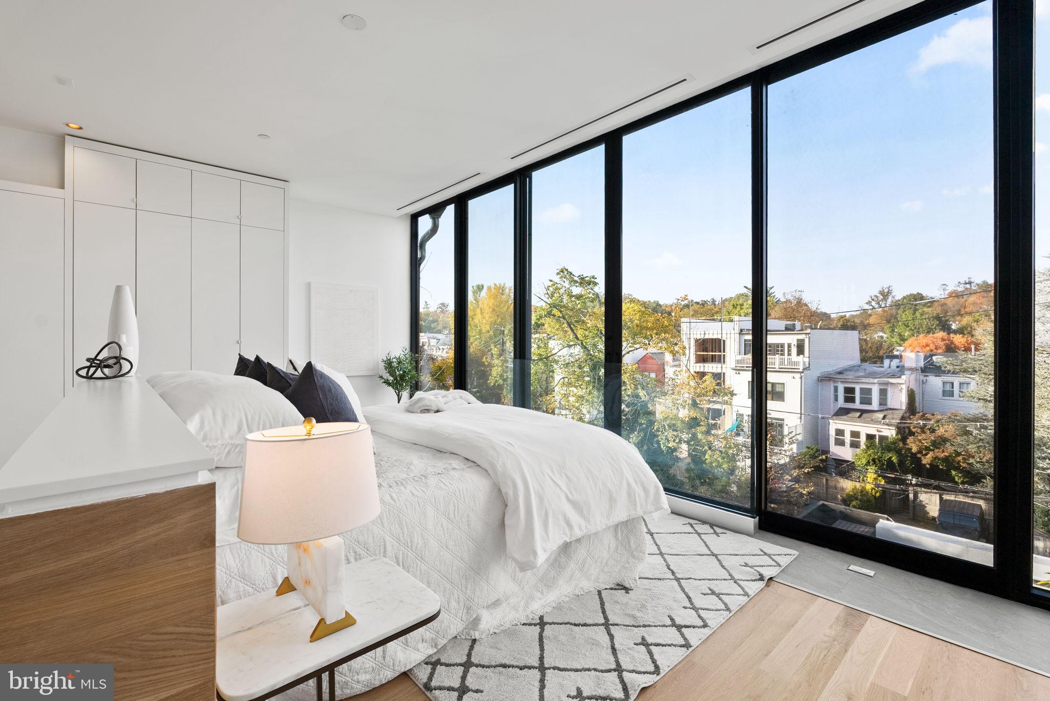 3623 R Street Northwest Washington, DC 20007 - Photo 22 of 87 a bedroom with a bed and large window