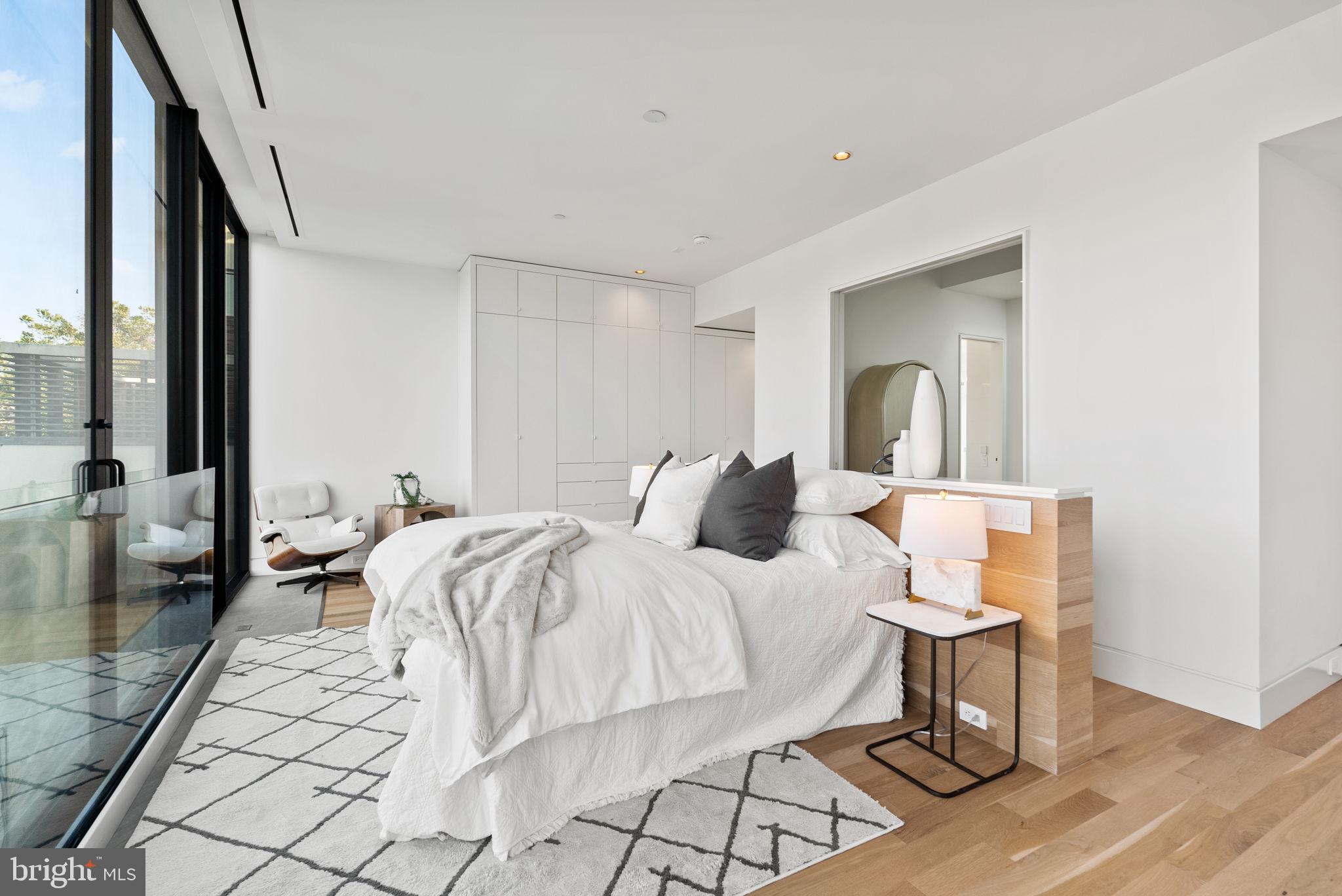 3623 R Street Northwest Washington, DC 20007 - Photo 25 of 87 a bed room with a bed and a mirror