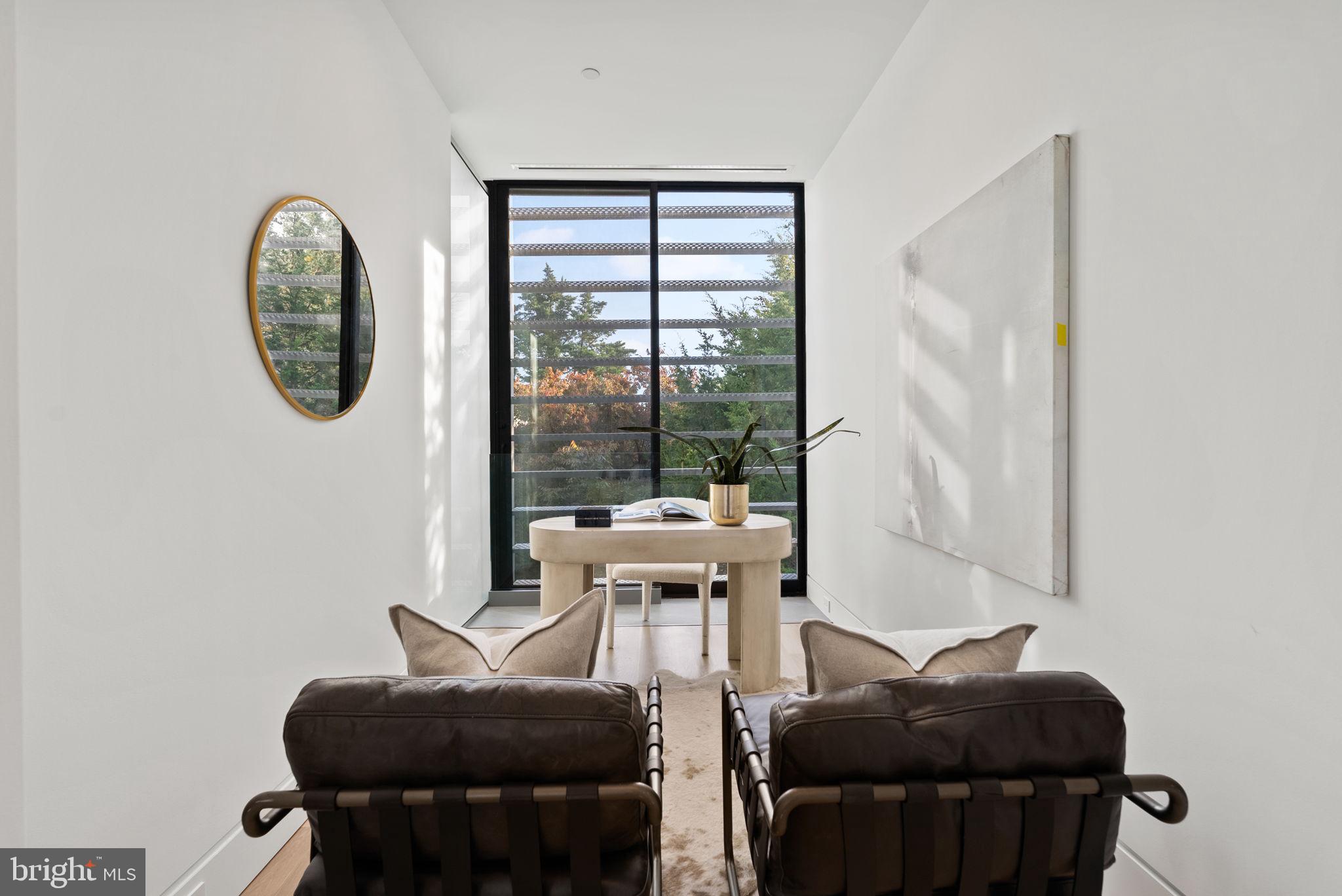 3623 R Street Northwest Washington, DC 20007 - Photo 29 of 87 a living room with furniture and a floor to ceiling window