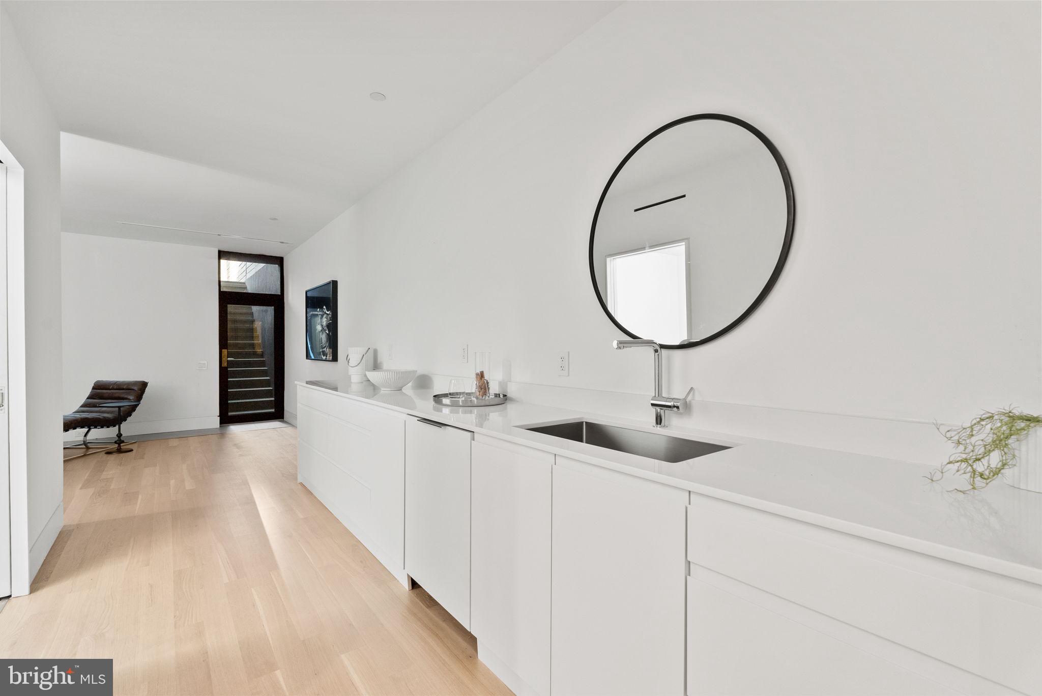 3623 R Street Northwest Washington, DC 20007 - Photo 31 of 87 a en suite bathroom with a sink and a mirror