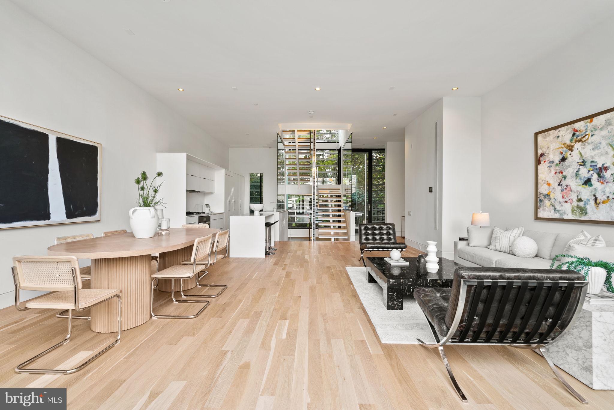 3623 R Street Northwest Washington, DC 20007 - Photo 38 of 87 a living room with furniture a rug and a flat screen tv