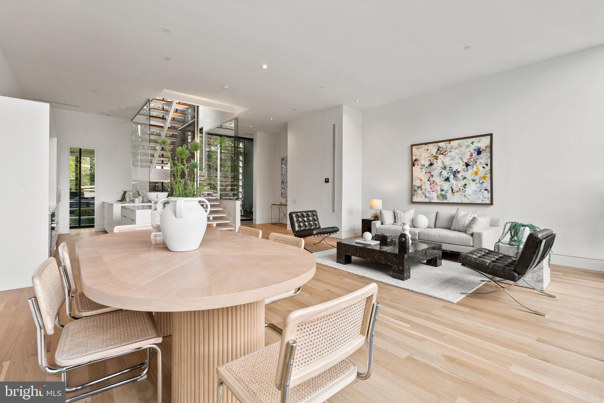 3623 R Street Northwest Washington, DC 20007 - Photo 39 of 87 a living room with furniture a large window and dining table