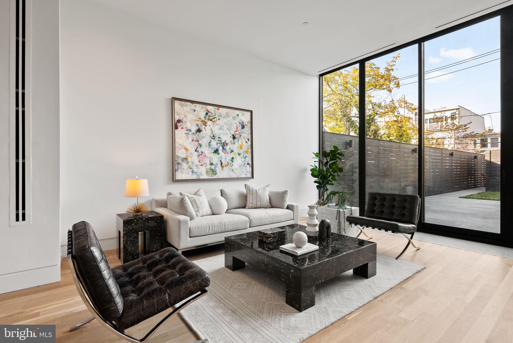 3623 R Street Northwest Washington, DC 20007 - Photo 5 of 87 a living room with furniture and a large window with outer view